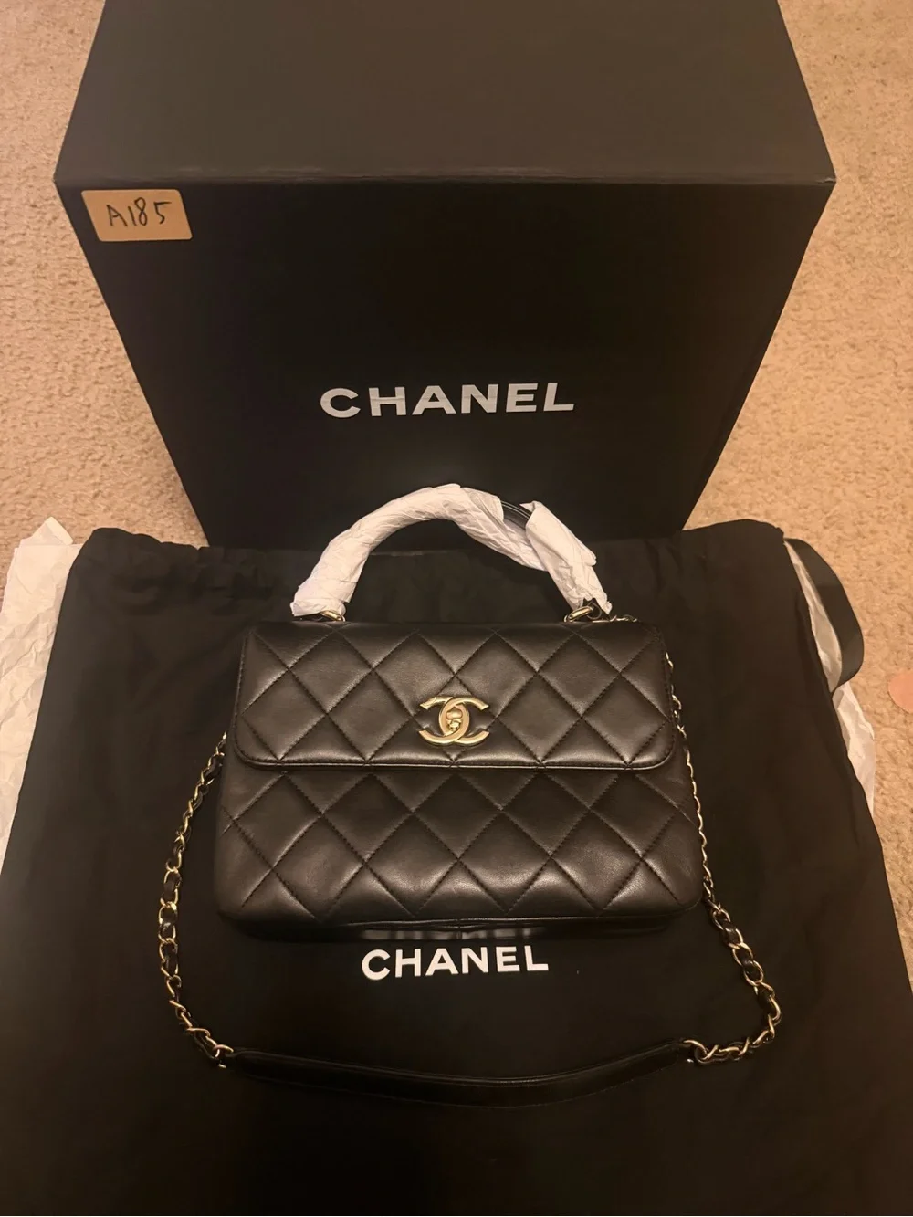 New CHANEL Black Quilted Leather Mini Top Handle Bag with Gold Hardware